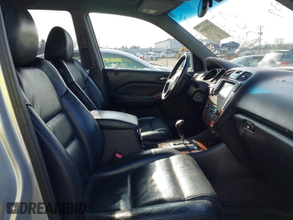 2004 Acura MDX Touring Pkg w/Navigation with VIN 2HNYD18834H534807, listed as a IAAI auction lot 41551039 with 218,827 mi miles. Bid and sale history available at carsss.com. Image 5.