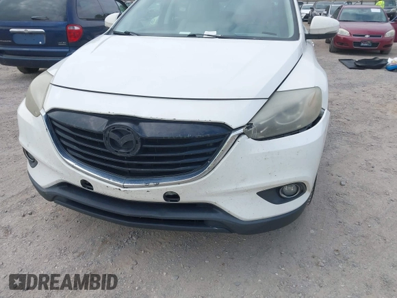 2015 Mazda CX-9 Grand Touring with VIN JM3TB2DA7F0448886, listed as a IAAI auction lot 42440203 with 108,765 mi miles and . Bid and sale history available at DreamBid. Image 6.