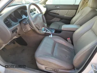 2002 Acura RL with VIN JH4KA96542C003755, listed as a Copart auction lot 77580384 with 153,548 mi miles and Salvage Title. Bid and sale history available at carsss.com. Image 7.