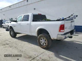 2014 Ram 2500 Laramie with VIN 3C6UR5FL3EG177142, listed as a Copart auction lot 84634854 with Not Provided miles and Salvage Title. Bid and sale history available at carsss.com. Image 2.