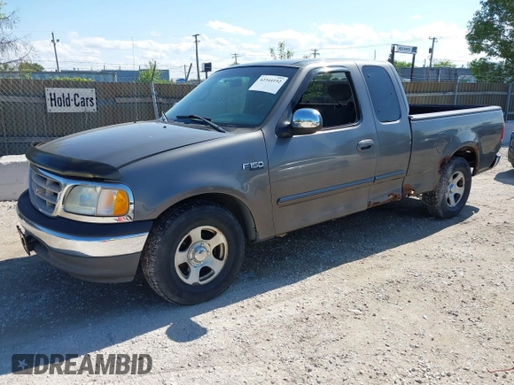2002 Ford F-150 XL with VIN 2FTRX17262CA42006, listed as a IAAI auction lot 42344192 with 165,169 mi miles and . Bid and sale history available at DreamBid. Image 2.