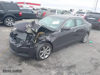 2014 Cadillac ATS Standard RWD with VIN 1G6AA5RX5E0179774, listed as a IAAI auction lot 41481032 with 85,189 mi miles. Bid and sale history available at carsss.com. Image 2.