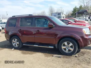 2009 Honda Pilot EX-L with VIN 5FNYF48639B020937, listed as a IAAI auction lot 41804771 with 226,668 mi miles and . Bid and sale history available at carsss.com. Image 13.
