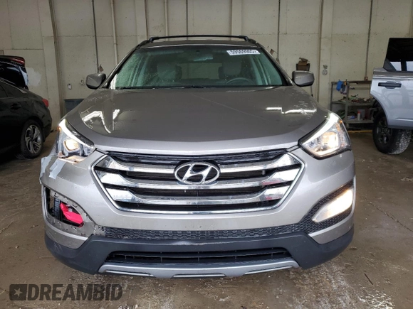 2014 Hyundai Santa Fe with VIN 5XYZU3LB1EG227984, listed as a Copart auction lot 59569905 with 102,477 mi miles and Salvage title. Bid and sale history available at DreamBid. Image 5.