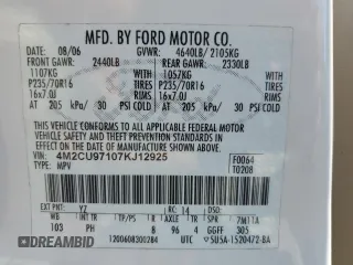 2007 Mercury Mariner Premier with VIN 4M2CU97107KJ12925, listed as a Copart auction lot 62371895 with 141,576 mi miles and Salvage title. Bid and sale history available at DreamBid. Image 14.