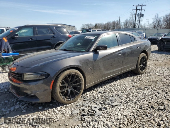 2015 Dodge Charger RT with VIN 2C3CDXCT1FH886158, listed as a Copart auction lot 49090355 with 65,500 mi miles and Salvage Title. Bid and sale history available at DreamBid. Image 1.
