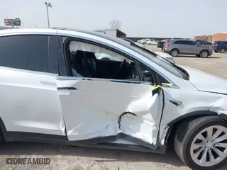 2018 Tesla Model X 75D with VIN 5YJXCBE26JF140049, listed as a IAAI auction lot 41712865 with 48,684 mi miles. Bid and sale history available at carsss.com. Image 6.