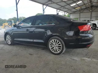 2012 Volkswagen Jetta SEL with VIN 3VWLX7AJ2CM409477, listed as a Copart auction lot 59476915 with 156,035 mi miles and Salvage title. Bid and sale history available at DreamBid. Image 2.