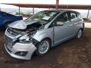 2015 Ford C-Max SEL with VIN 1FADP5BU6FL114222, listed as a IAAI auction lot 41956010 with 149,023 mi miles. Bid and sale history available at carsss.com. Image 2.
