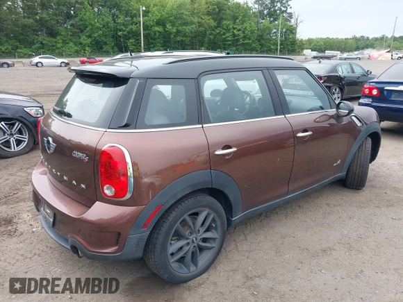 2014 MINI Countryman S with VIN WMWZC5C5XEWP38408, listed as a IAAI auction lot 42360746 with 136,266 mi miles and . Bid and sale history available at DreamBid. Image 4.