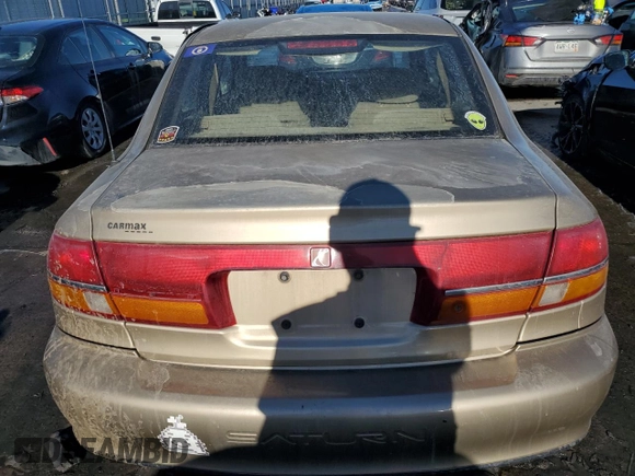 2001 Saturn LS z VIN 1G8JU52FX1Y552416, wystawiony jako Copart lot #41967165 z przebiegiem 196 403 mil mil oraz Szkody całkowita. Historia ofert i sprzedaży dostępna na DreamBid. Obrazek 6.