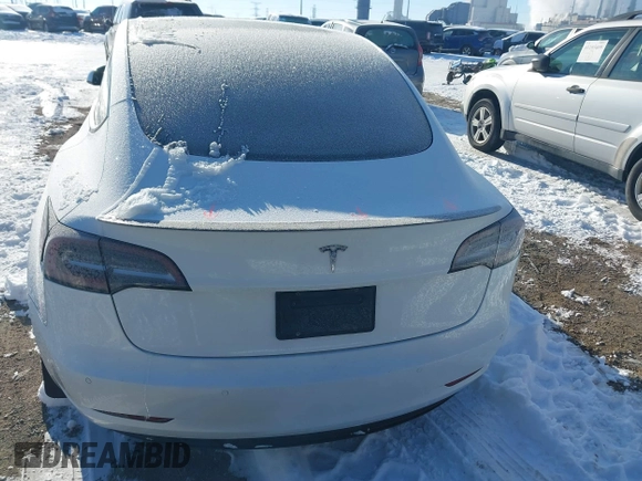 2021 Tesla Model 3 Performance with VIN 5YJ3E1EC1MF063445, listed as a IAAI auction lot 41293243 with 43,143 mi miles and . Bid and sale history available at DreamBid. Image 16.