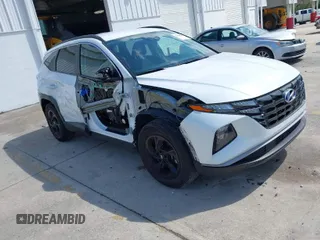 2022 Hyundai Tucson SEL z VIN 5NMJB3AE1NH027676, wystawiony jako IAAI lot #41941386 z przebiegiem 35 809 mil mil oraz . Historia ofert i sprzedaży dostępna na DreamBid. Obrazek 1.