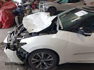2016 Nissan Maxima SL z VIN 1N4AA6APXGC383444, wystawiony jako IAAI lot #41766069 z przebiegiem 92 629 mil mil oraz . Historia ofert i sprzedaży dostępna na DreamBid. Obrazek 18.