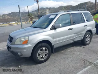 2005 Honda Pilot EX-L with NAVI with VIN 2HKYF18755H552502, listed as a IAAI auction lot 41921122 with 187,904 mi miles. Bid and sale history available at carsss.com. Image 17.