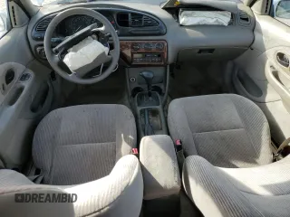 1999 Mercury Mystique GS z VIN 1MEFM653XXK629587, wystawiony jako Copart lot #78900204 z przebiegiem 139 060 mil mil oraz Szkody całkowita. Historia ofert i sprzedaży dostępna na DreamBid. Obrazek 8.