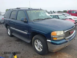 2005 GMC Yukon SLT with VIN 1GKEK13T15R196436, listed as a IAAI auction lot 41952646 with 247,487 mi miles. Bid and sale history available at carsss.com. Image 1.