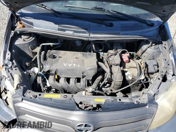 2004 Scion xA with VIN JTKKT624140043635, listed as a Copart auction lot 52808815 with 197,115 mi miles and Salvage Title. Bid and sale history available at DreamBid. Image 11.