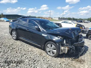 2016 Kia Optima Hybrid EX with VIN KNAGN4ADXG5094181, listed as a Copart auction lot 73480994 with 90,721 mi miles and Salvage Title. Bid and sale history available at carsss.com. Image 4.