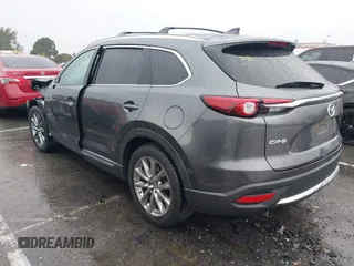 2019 Mazda CX-9 Grand Touring with VIN JM3TCADY4K0315095, listed as a IAAI auction lot 41573317 with 64,635 mi miles. Bid and sale history available at carsss.com. Image 3.