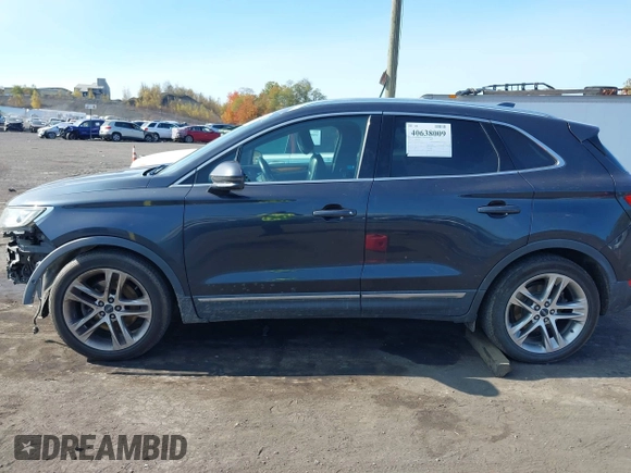 2015 Lincoln MKC with VIN 5LMCJ2A93FUJ24373, listed as a IAAI auction lot 40638009 with 127,336 mi miles. Bid and sale history available at carsss.com. Image 14.