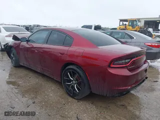 2017 Dodge Charger SE with VIN 2C3CDXBG3HH635102, listed as a IAAI auction lot 41884462 with 143,292 mi miles. Bid and sale history available at carsss.com. Image 3.