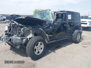 2011 Jeep Wrangler Unlimited Rubicon with VIN 1J4BA6H15BL580301, listed as a IAAI auction lot 42673014 with Not provided miles and . Bid and sale history available at DreamBid. Image 2.