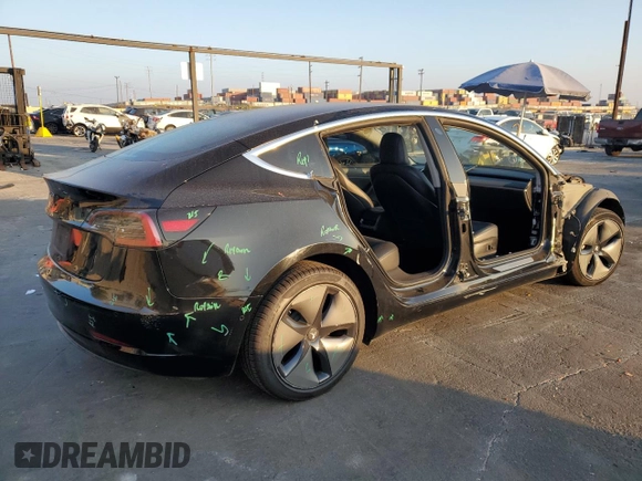 2019 Tesla Model 3 Mid Range z VIN 5YJ3E1EA8KF306096, wystawiony jako Copart lot #82712354 z przebiegiem 170 775 mil mil oraz Szkoda całkowita • Salvage title. Historia ofert i sprzedaży dostępna na DreamBid. Obrazek 3.