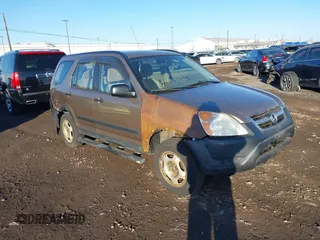 2002 Honda CR-V LX z VIN SHSRD78442U004223, wystawiony jako IAAI lot #41821690 z przebiegiem 158 074 mil mil oraz . Historia ofert i sprzedaży dostępna na DreamBid. Obrazek 1.
