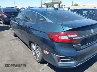 2018 Honda Clarity Touring with VIN JHMZC5F3XJC006383, listed as a IAAI auction lot 41996524 with 100,646 mi miles and . Bid and sale history available at DreamBid. Image 3.