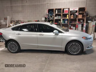 2018 Ford Fusion Titanium with VIN 3FA6P0D91JR138698, listed as a IAAI auction lot 41992522 with 95,017 mi miles and . Bid and sale history available at DreamBid. Image 14.