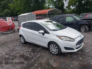 2014 Ford Fiesta S z VIN 3FADP4TJ1EM191222, wystawiony jako IAAI lot #42456575 z przebiegiem 110 969 mil mil oraz . Historia ofert i sprzedaży dostępna na DreamBid. Obrazek 1.