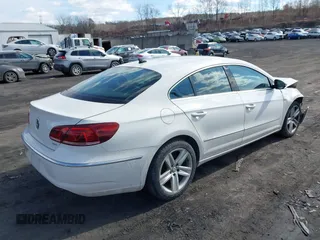 2013 Volkswagen CC Sport with VIN WVWBN7AN9DE516590, listed as a IAAI auction lot 41684586 with 153,312 mi miles. Bid and sale history available at carsss.com. Image 4.