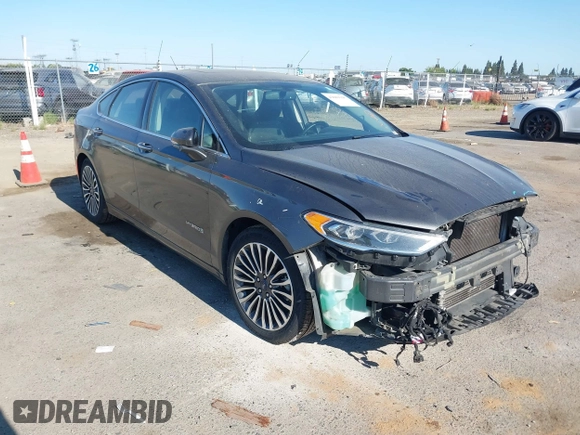 2017 Ford Fusion Hybrid SE с VIN 3FA6P0LU7HR110436, выставлен на аукционе IAAI как лот 42669395 с пробегом 104 472 миль миль и . История ставок и продаж доступна на DreamBid. Изображение 1.