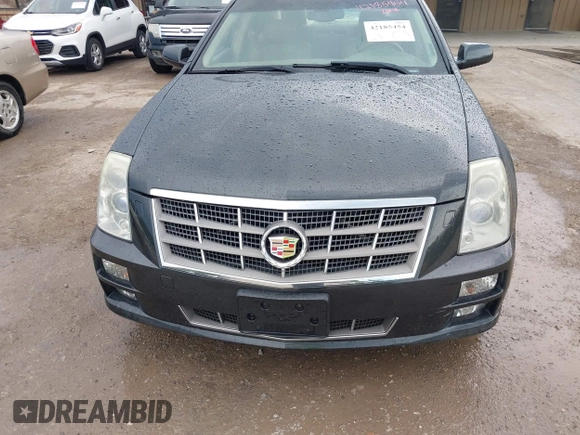 2008 Cadillac STS RWD with VIN 1G6DK67V980165768, listed as a IAAI auction lot 42185454 with 214,813 mi miles and . Bid and sale history available at DreamBid. Image 6.