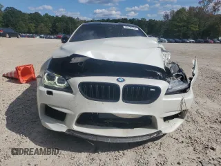 2014 BMW M6 z VIN WBSLX9C51ED160529, wystawiony jako Copart lot #76238844 z przebiegiem 57 557 mil mil oraz Szkoda całkowita • Salvage title. Historia ofert i sprzedaży dostępna na DreamBid. Obrazek 5.