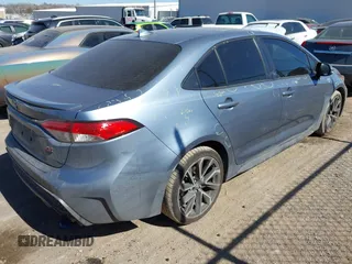 2021 Toyota Corolla SE with VIN JTDS4MCE4MJ060004, listed as a IAAI auction lot 41678974 with 49,424 mi miles and . Bid and sale history available at DreamBid. Image 4.