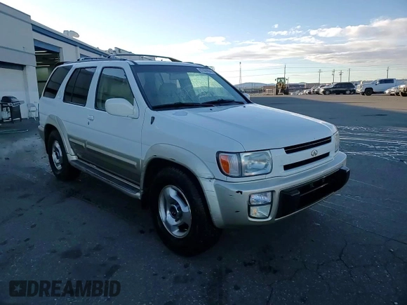 2000 Infiniti QX4 z VIN JNRAR07Y3YW084474, wystawiony jako Copart lot #87089994 z przebiegiem 237 974 mil mil oraz Szkody całkowita. Historia ofert i sprzedaży dostępna na DreamBid. Obrazek 10.