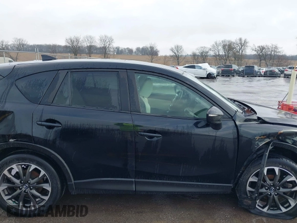 2016 Mazda CX-5 Grand Touring with VIN JM3KE4DY3G0769448, listed as a IAAI auction lot 41947725 with 154,051 mi miles and . Bid and sale history available at carsss.com. Image 13.