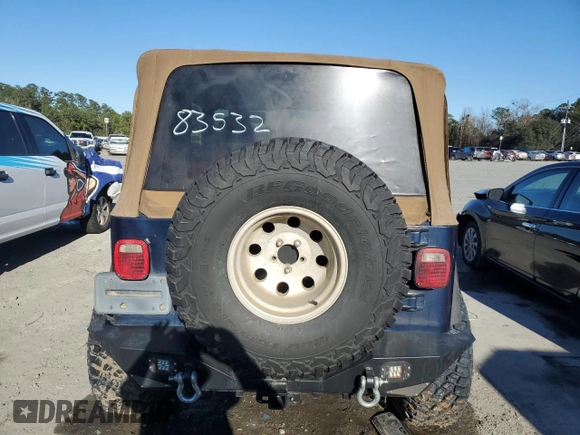 2000 Jeep Wrangler Sport with VIN 1J4FA49S7YP802304, listed as a Copart auction lot 47854795 with 0 mi miles and Salvage Title. Bid and sale history available at carsss.com. Image 6.