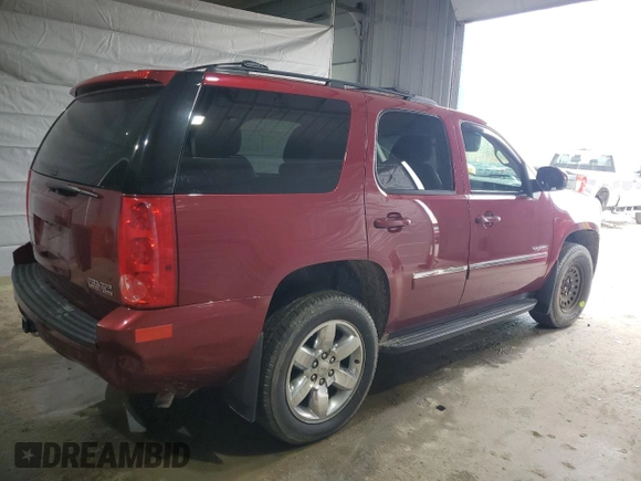 2011 GMC Yukon SLT with VIN 1GKS2CE06BR200400, listed as a Copart auction lot 50156125 with 203,008 mi miles and Salvage Title. Bid and sale history available at DreamBid. Image 3.