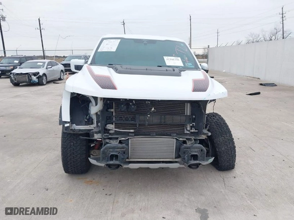 2022 Ford F-150 Raptor with VIN 1FTFW1RG1NFA99947, listed as a IAAI auction lot 41305356 with 33,828 mi miles. Bid and sale history available at carsss.com. Image 12.