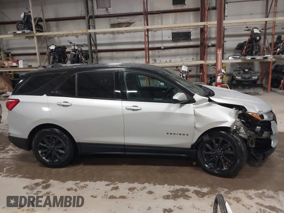 2018 Chevrolet Equinox LT z VIN 2GNAXSEV6J6198809, wystawiony jako IAAI lot #41945758 z przebiegiem 196 485 mil mil oraz . Historia ofert i sprzedaży dostępna na DreamBid. Obrazek 14.