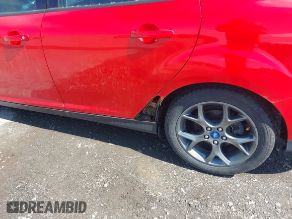 2013 Ford Focus SE z VIN 1FADP3F27DL227588, wystawiony jako IAAI lot #42210560 z przebiegiem 248 185 mil mil oraz . Historia ofert i sprzedaży dostępna na DreamBid. Obrazek 6.