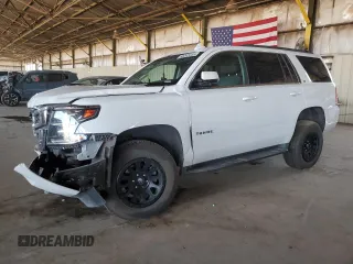 2019 Chevrolet Tahoe LT with VIN 1GNSKBKC5KR214476, listed as a Copart auction lot 60292445 with 97,778 mi miles and Salvage title. Bid and sale history available at DreamBid. Image 1.