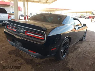 2016 Dodge Challenger SXT with VIN 2C3CDZAG0GH137483, listed as a IAAI auction lot 41970836 with 111,148 mi miles. Bid and sale history available at carsss.com. Image 4.