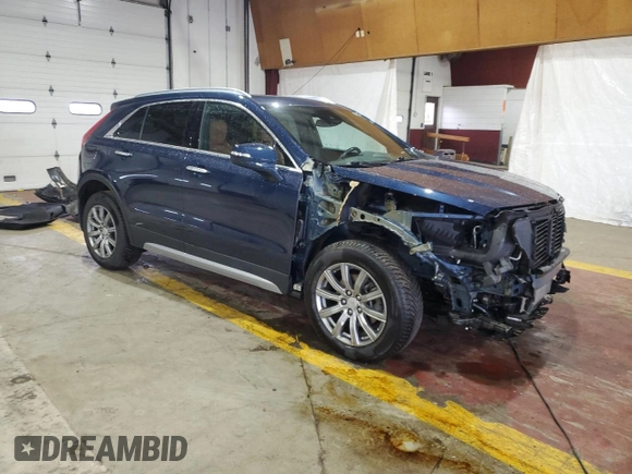 2021 Cadillac XT4 AWD Premium Luxury with VIN 1GYFZDR41MF031543, listed as a Copart auction lot 61085805 with 21,318 mi miles and Salvage title. Bid and sale history available at DreamBid. Image 4.