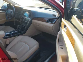 2016 Hyundai Sonata Hybrid Limited with VIN KMHE34L11GA027569, listed as a IAAI auction lot 41409224 with 111,006 mi miles. Bid and sale history available at carsss.com. Image 5.