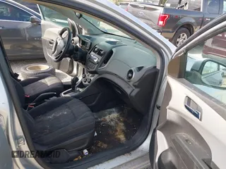 2015 Chevrolet Sonic LT with VIN 1G1JC5SH6F4121976, listed as a IAAI auction lot 42143052 with 63,885 mi miles and . Bid and sale history available at DreamBid. Image 5.