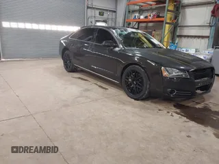2012 Audi A8 L with VIN WAURVAFD6CN014546, listed as a IAAI auction lot 41357932 with 93,516 mi miles. Bid and sale history available at carsss.com. Image 1.